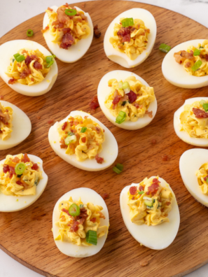 Southern deviled eggs made in the Instant Pot, topped with paprika and arranged on a serving plate.