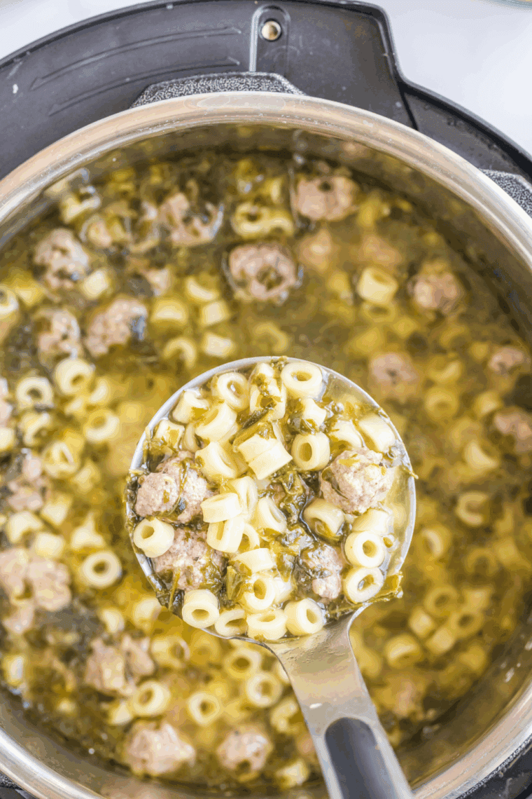 Panera-style Italian Wedding Soup with bite-sized meatballs, pasta, and spinach in savory broth.