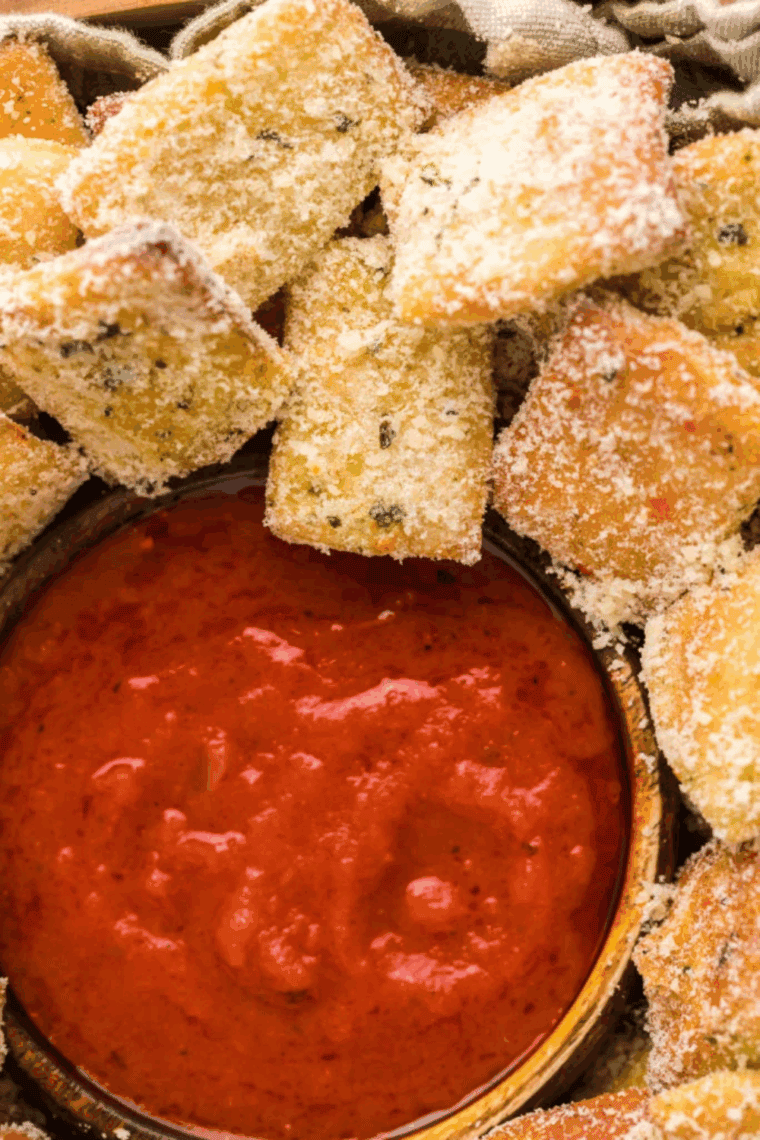 A rich, red homemade spaghetti sauce simmering in a pot, with visible pieces of tomato and herbs, replicating the smooth texture of Prego sauce.