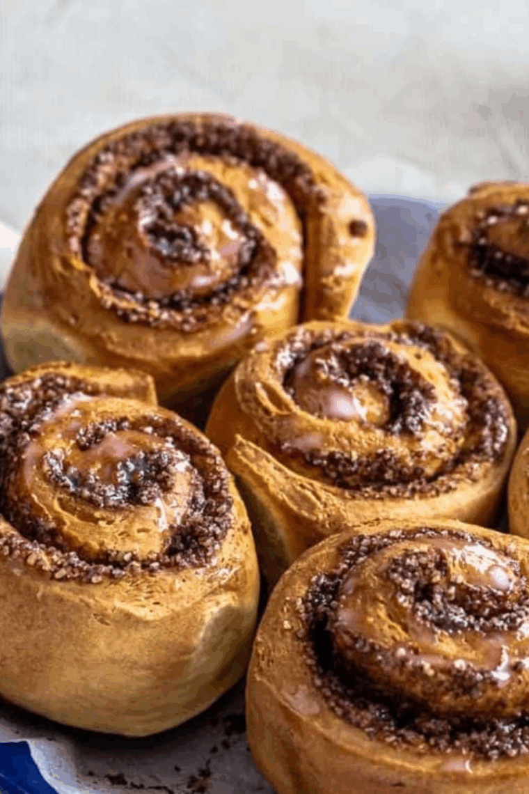 Homemade Wendy’s Cinnabon Pull-Apart with gooey cinnamon glaze and cream cheese frosting.