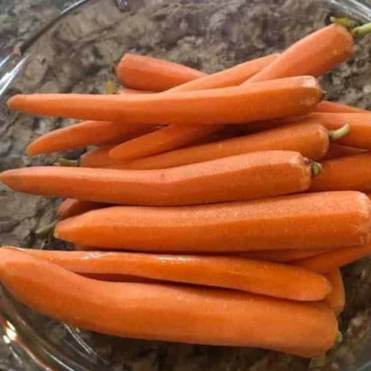 "Fresh whole carrots ready to be air-fried"