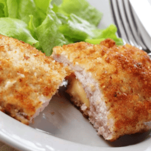 Air Fryer Chicken Cordon Bleu ---When it’s time to prepare a meal that satisfies everyone in your family, look no further than air fryer chicken cordon bleu! This dish combines all the classic comfort food flavors – crispy and crunchy chicken cutlets, perfect Swiss cheese, and savory ham – with an added kick from the air-fryer. The best part is that you don't have to break out the deep fat fryer– this traditional chicken cordon bleu version has all the flavor but none of the mess or extra calories found in classic recipes. The result? Crispy outside, tender inside deliciousness without any unhealthy fried accompaniments! With this simple recipe, find out how to whip up a healthier version of your favorite using an air-fryer