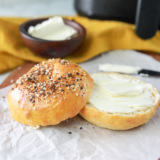 Air fryer everything bagels recipe card featuring 2-ingredient Greek yogurt dough topped with everything bagel seasoning