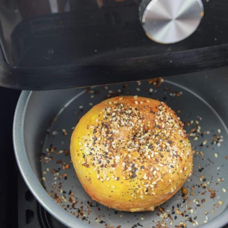 Air frying everything bagels until they are golden brown and crispy