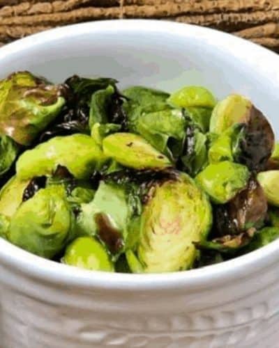 Brussels sprouts that are air-fried and drizzled with a sweet and tangy honey balsamic sauce. These little discs of deliciousness will have your mouth watering as you bite into them. The best part is, they take just minutes to make!