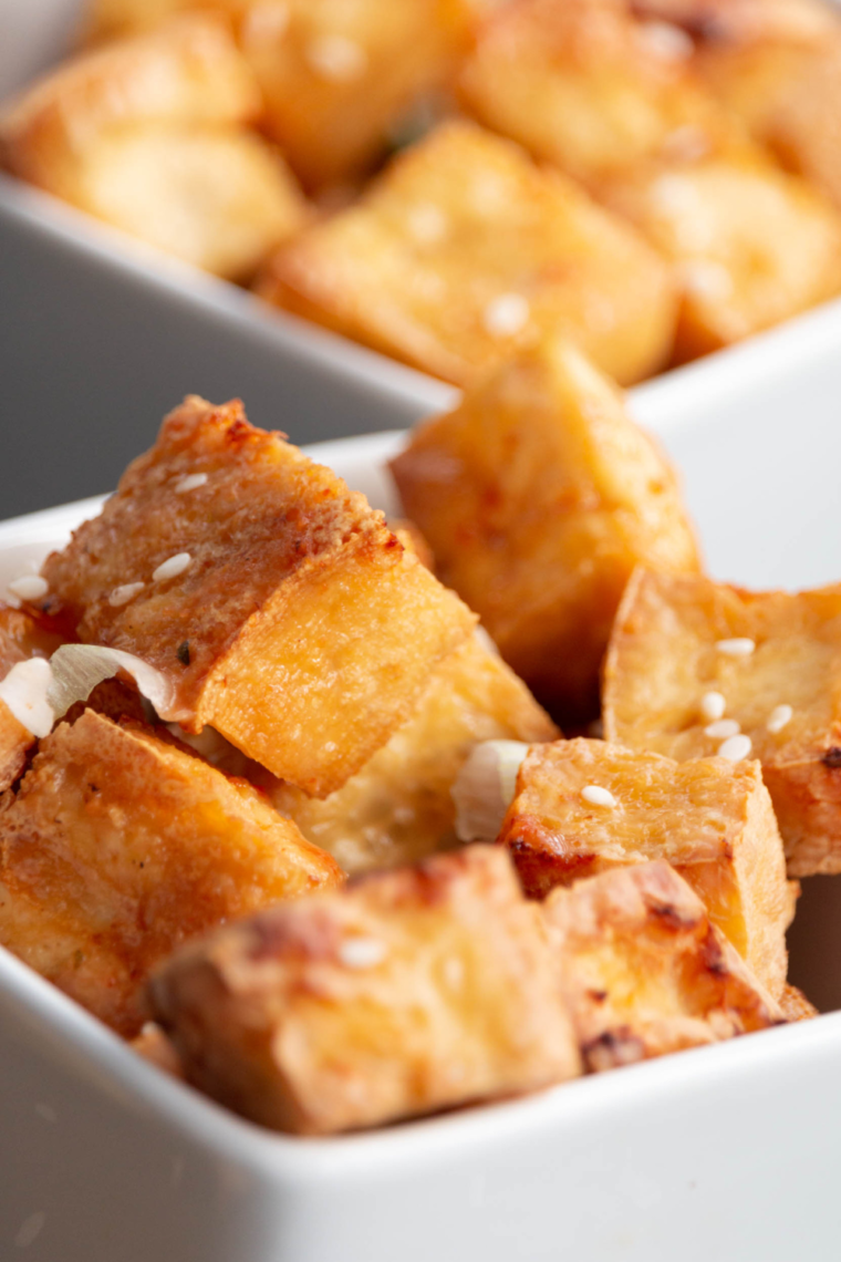 Close-up of crispy Air Fryer Salt and Pepper Tofu on a serving platter