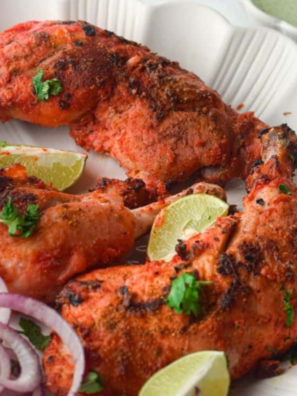 "Plate of Air Fryer Tandoori Chicken with vibrant spices and grilled appearance"