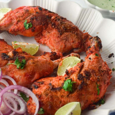 "Plate of Air Fryer Tandoori Chicken with vibrant spices and grilled appearance"