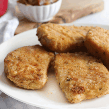 Cracker Barrel Country Fried Pork Chops with crispy breading and creamy gravy.