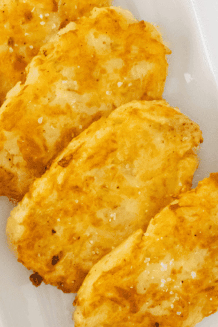 Golden, crispy Perkins-style hash browns served on a plate with breakfast sides