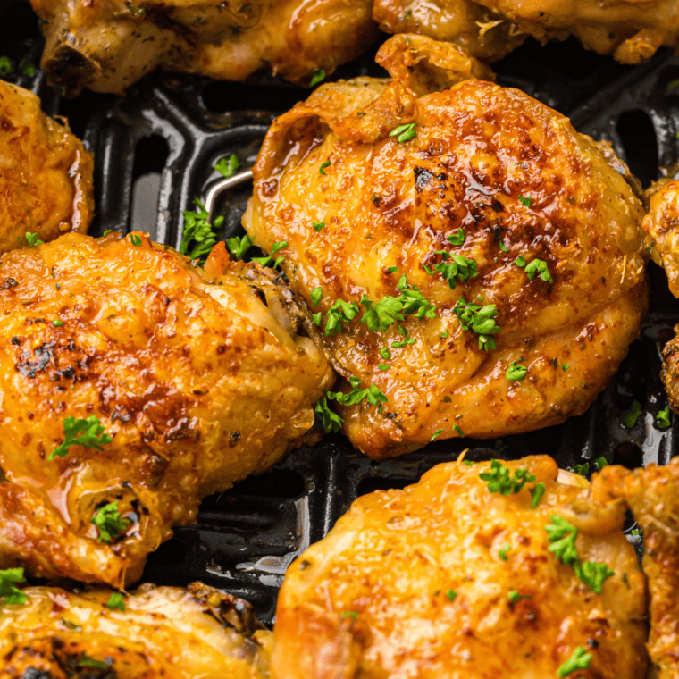 Golden-brown Smoky Air Fryer Chicken Thighs with crispy skin.