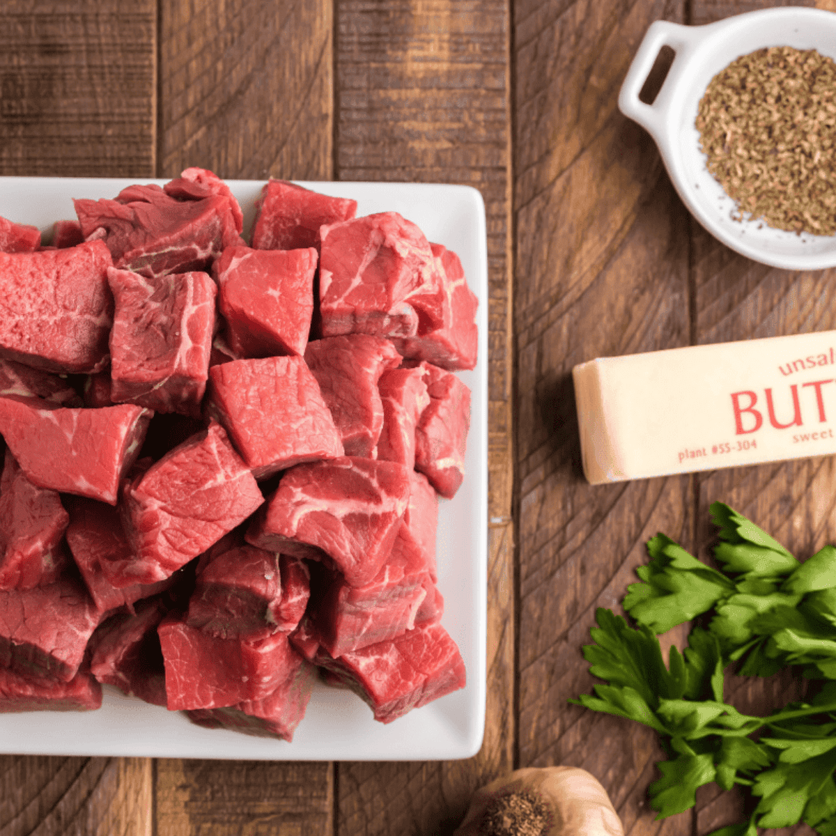 Ingredients needed for Texas Roadhouse Sirloin Beef Tips Recipe on kitchen table.