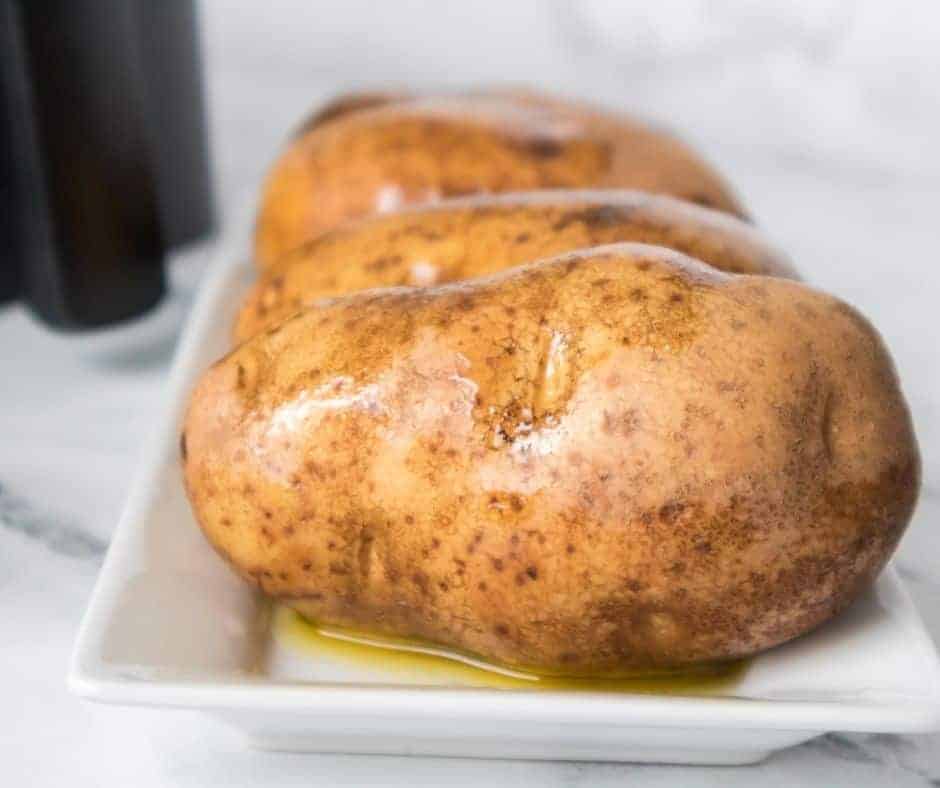 air fry baked potatoes on plate
