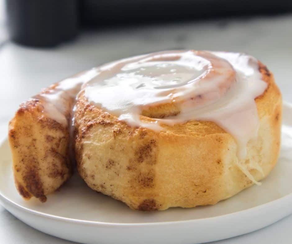 frosted air fryer cinnamon rolll