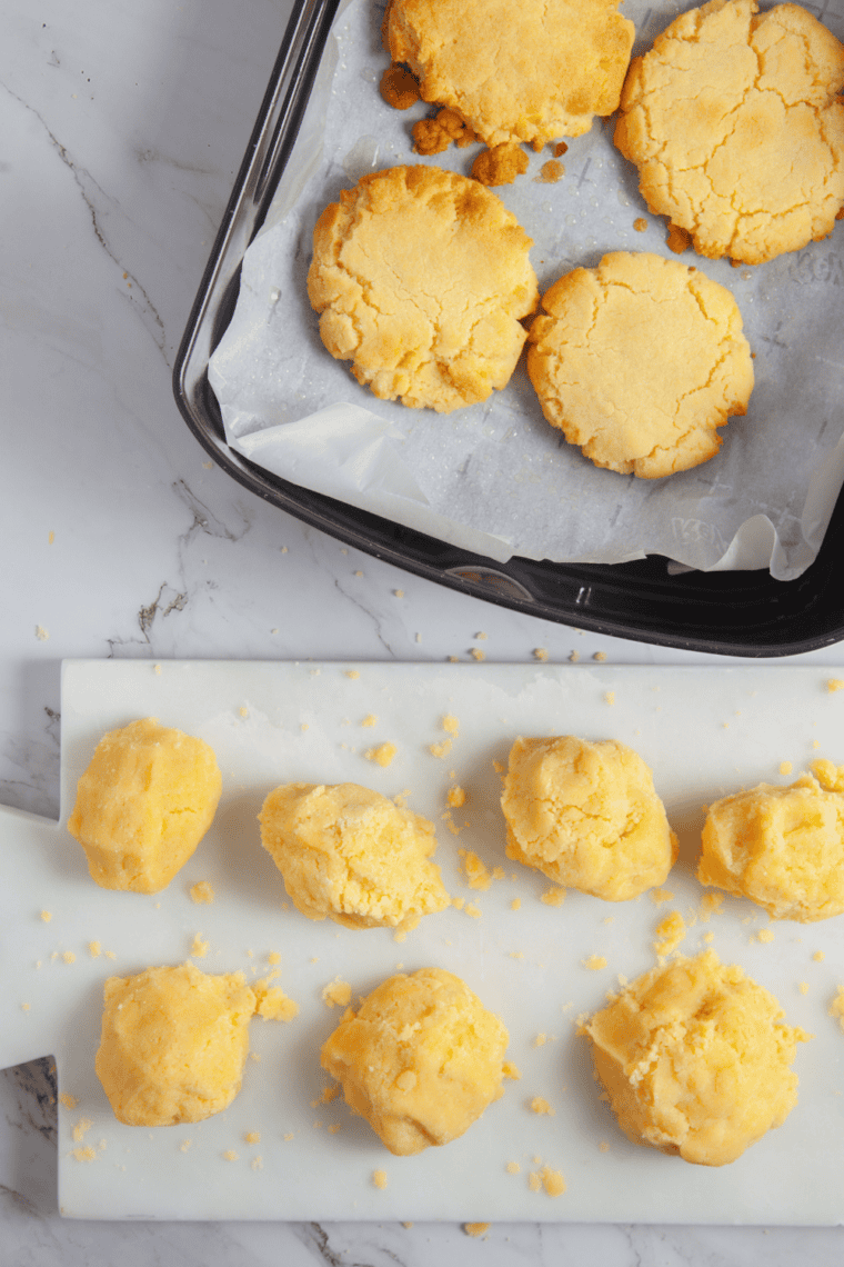Buttery golden 3-Ingredient Air Fryer Shortbread Cookies cooling on a wire rack, crisp edges and tender centers.