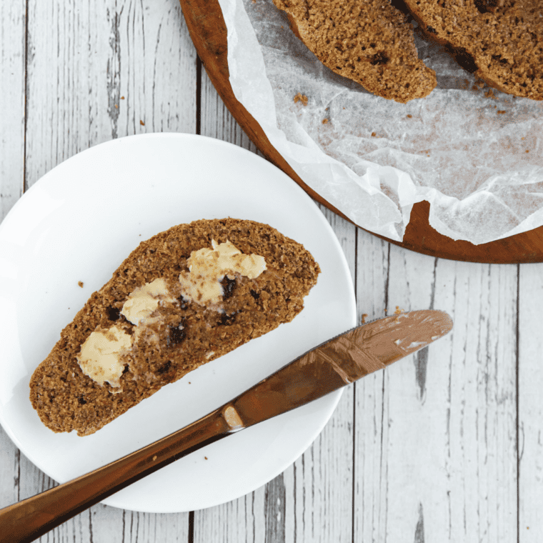 A slice of easy no-knead air fryer Boston brown bread on a plate