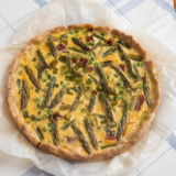 "Air Fryer Asparagus Quiche with crispy crust and creamy filling"