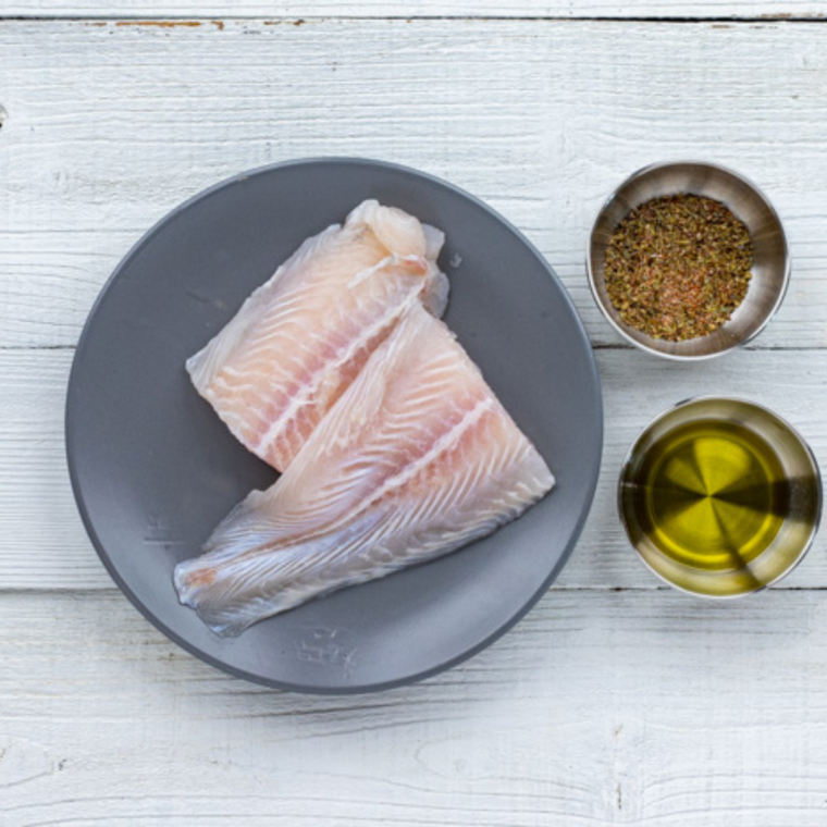 chilean sea bass fillets resting at room temperature before cooking