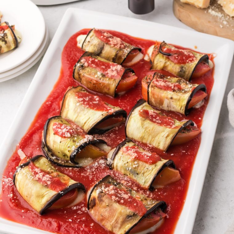 Air Fryer Eggplant Rollatini with mozzarella, tomato, oregano, and basil, air-fried to perfection.