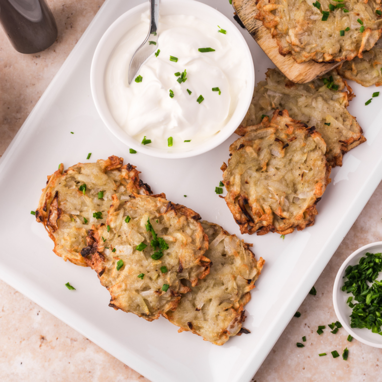 crispy golden air fryer latkes potato pancakes stacked on plate