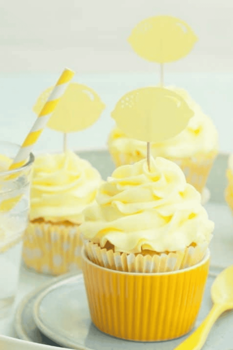 Air Fryer Lemon Cupcakes, golden and fluffy with bright lemon frosting on top.