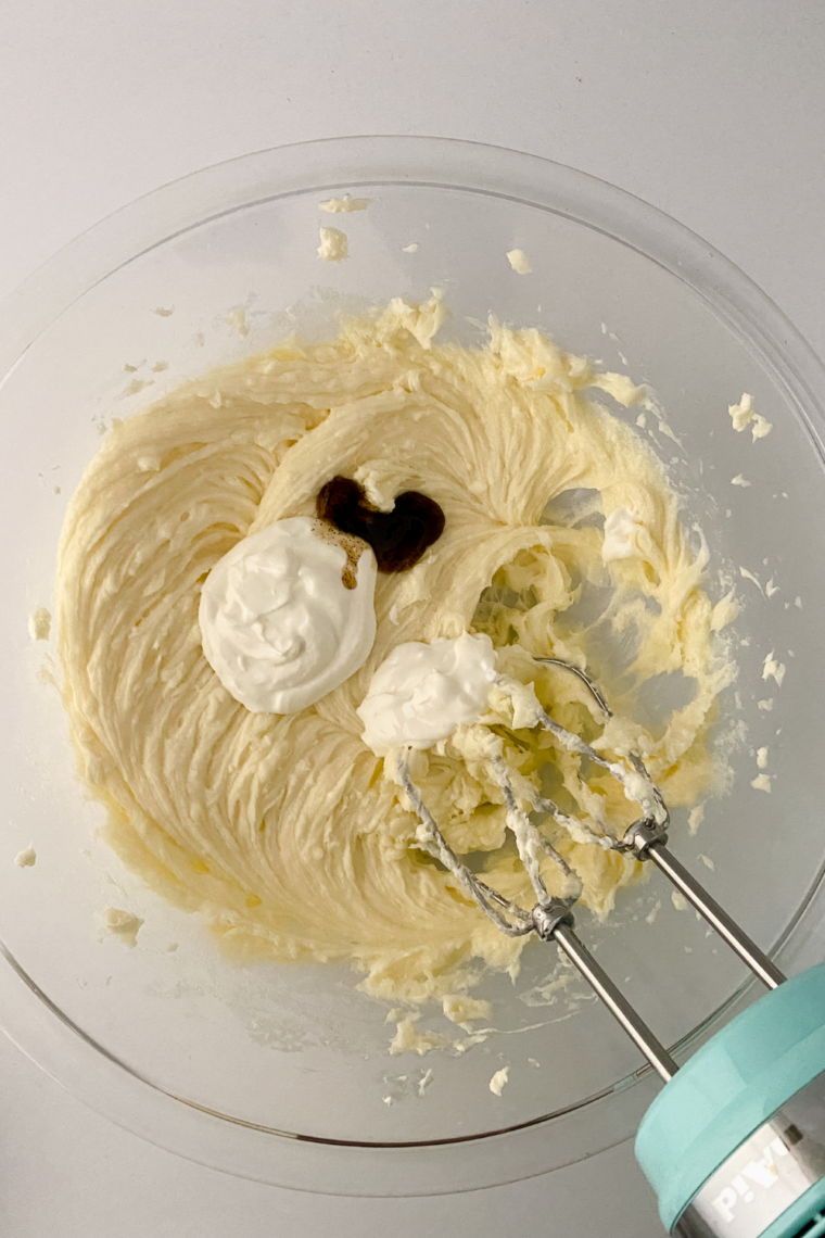 Cream cheese whipped until smooth in stand mixer with sugar and flour