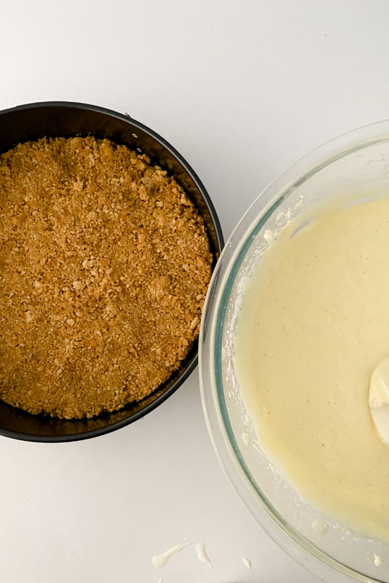 Eggs and flavorings added to cheesecake batter in mixer bowl
