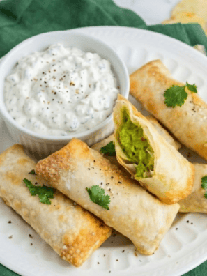 golden crispy air fryer avocado egg rolls with creamy avocado filling