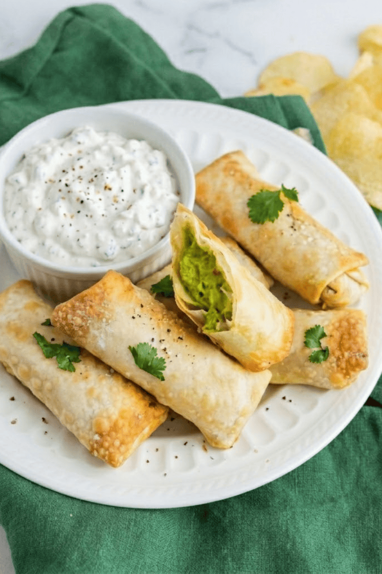 crispy golden avocado egg rolls from air fryer with creamy filling