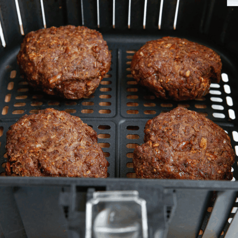 Cooked Easy Dairy Queen Flamethrower Burger Recipe in the air fryer basket.