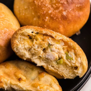 "Golden Air Fryer Chicken & Broccoli Biscuit Pies on a serving plate"