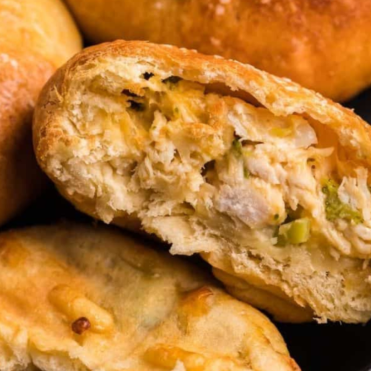 Golden-brown, freshly cooked Chicken & Broccoli Biscuit Pies in air fryer