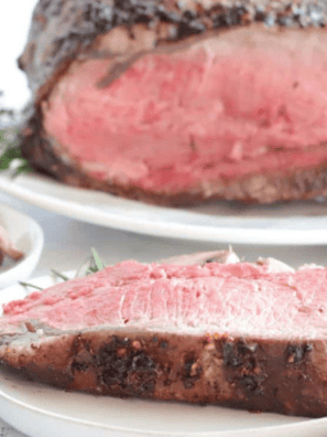 Air Fryer Prime Rib cooked to perfection with a crispy crust, ready to be served for a delicious meal.