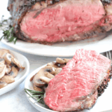 Juicy air fryer prime rib with crispy skin served on a white plate