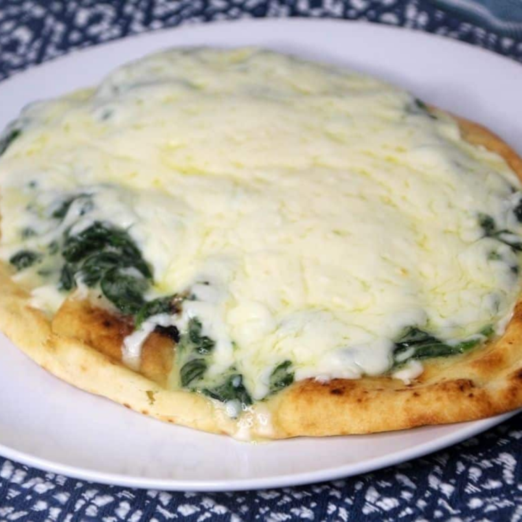 Air Fryer Florentine Flat Bread Pizza with creamy Alfredo, spinach, and melted five-cheese blend