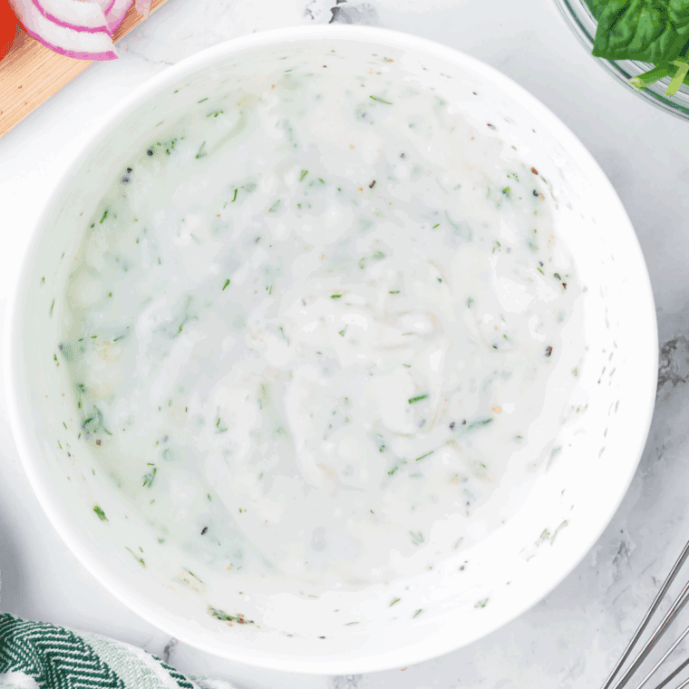 Mix all of the ingredients for Arby’s Tzatziki Sauce in a mixing bowl. until well combined.
