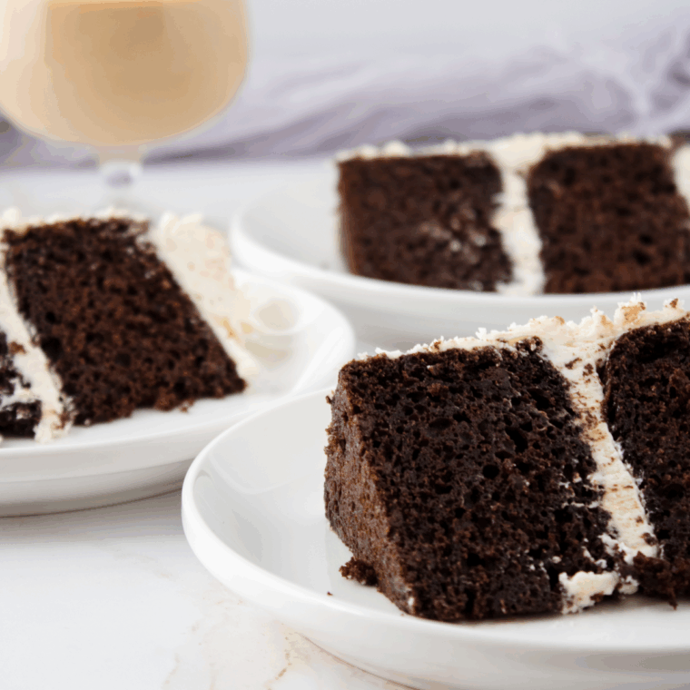 Air Fryer Bailey&rsquo;s Cake with golden crust and creamy buttercream rosettes