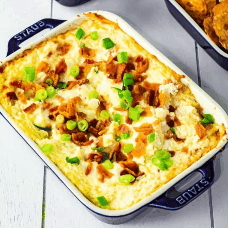 Golden, creamy cottage cheese dip in a ramekin from air fryer.
