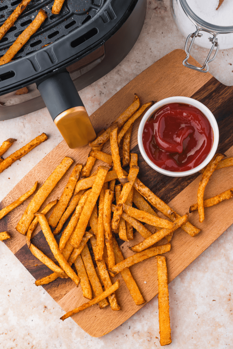 Crispy Air Fryer Jicama Fries, golden and crunchy, served as a healthy low-carb snack.