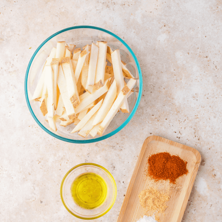 Ingredients needed for Air Fryer Jicama Fries on kitchen table.