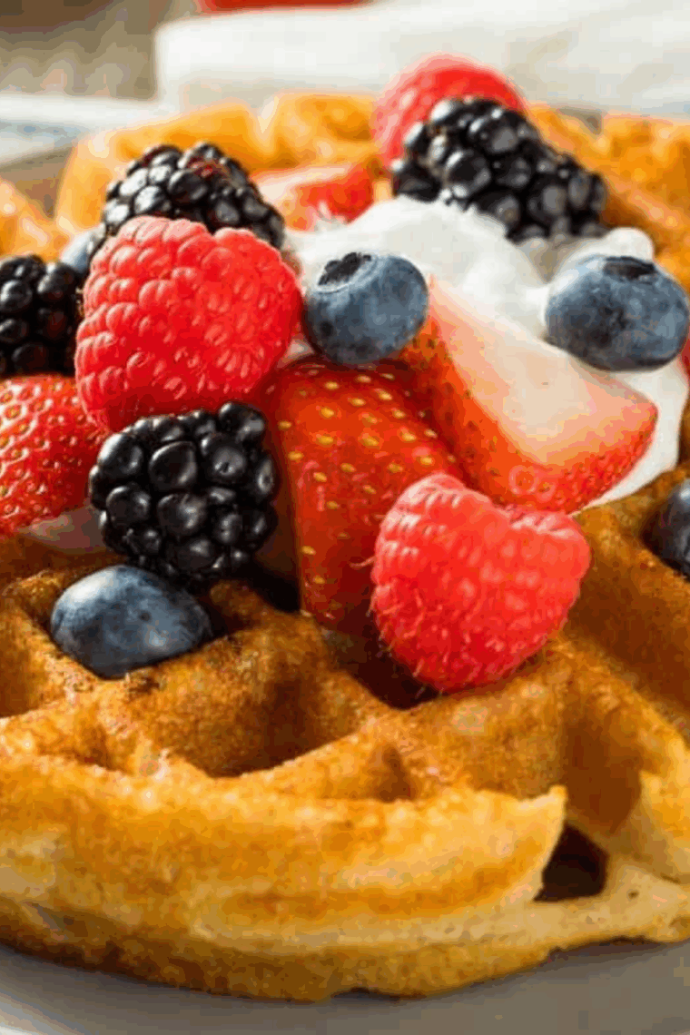 Air fryer Kodiak Cake waffles golden and crispy, served with toppings.