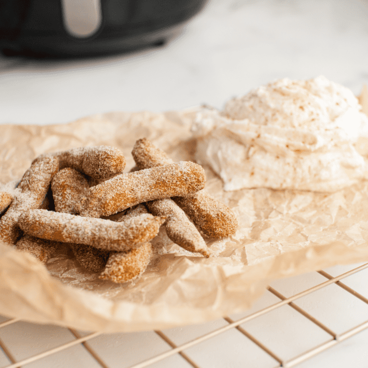Close-up of golden Air Fryer Pumpkin Churros coated in cinnamon sugar