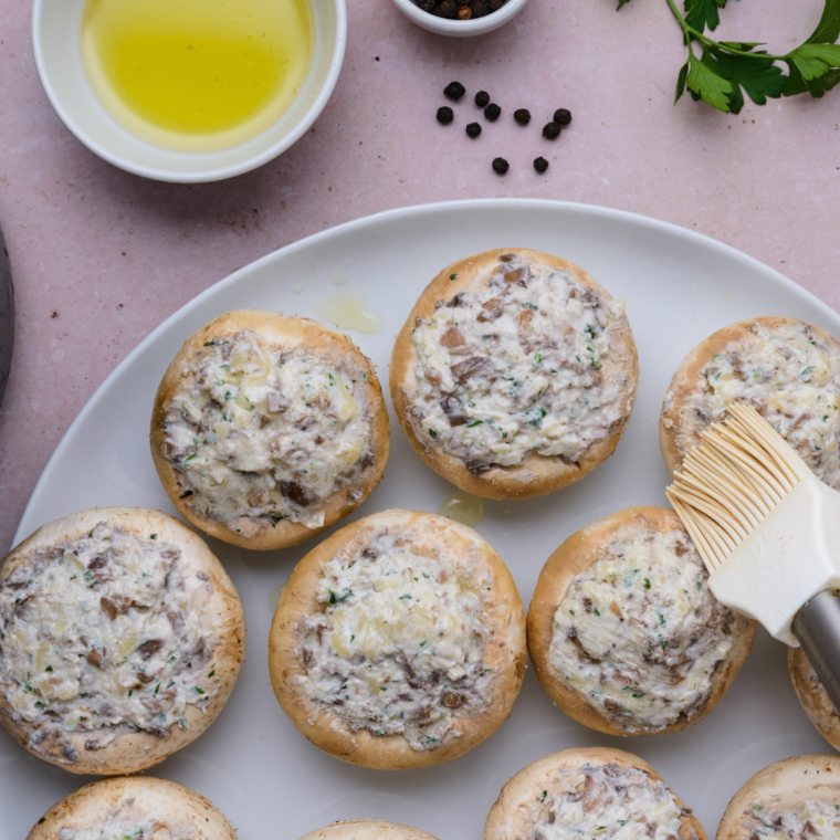 Fill each mushroom cap with the spinach and cheese mixture, pressing it in evenly.