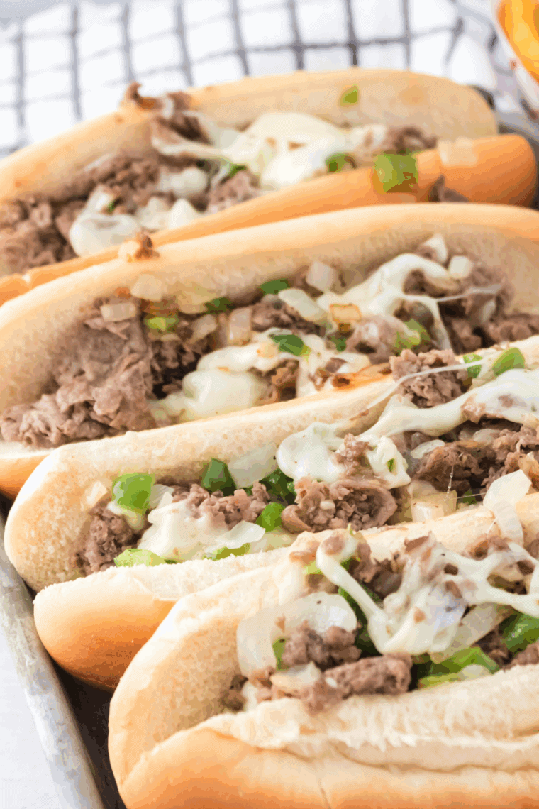 Arby’s Angus Cheesesteak sandwich with juicy ribeye, melted provolone, sautéed onions and peppers on a toasted hoagie bun.