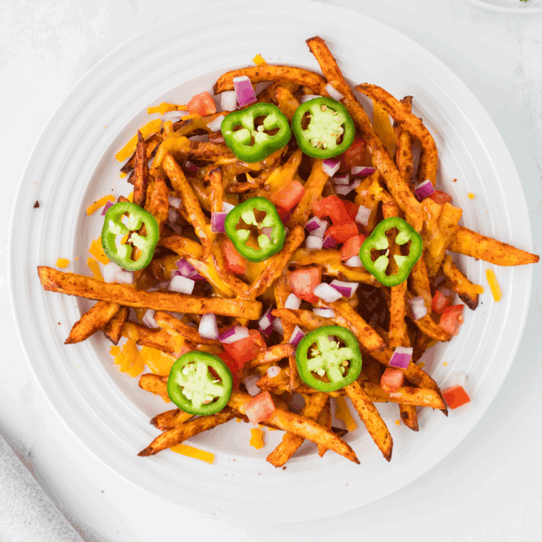 Creamy homemade Taco Bell cheese sauce in a bowl, ready for dipping with chips or tacos.