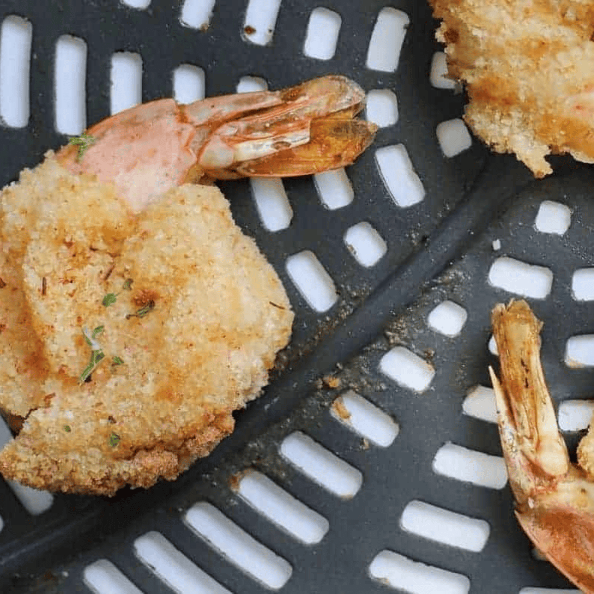 Plates of crispy Air Fryer Beer Battered Shrimp served with dipping sauce.