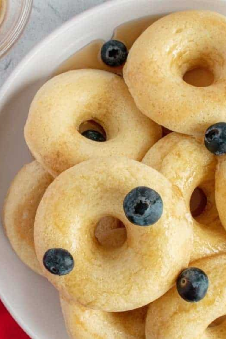 Batch donuts cooling with remaining batter ready