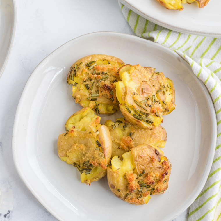 Cooking smashed potatoes in the air fryer until golden and crispy.