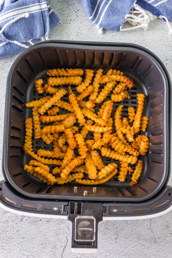 seasoned crinkle fries in air fryer basket