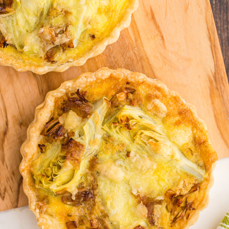 "Savory Air Fryer quiche featuring caramelized leeks and artichokes"